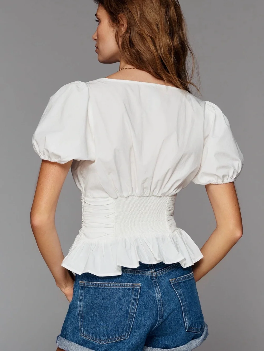 Anthropologie White Puff-Sleeve Peplum Top